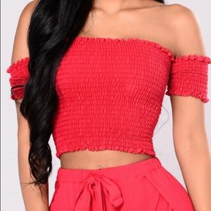 Red cuffed sleeve crop top